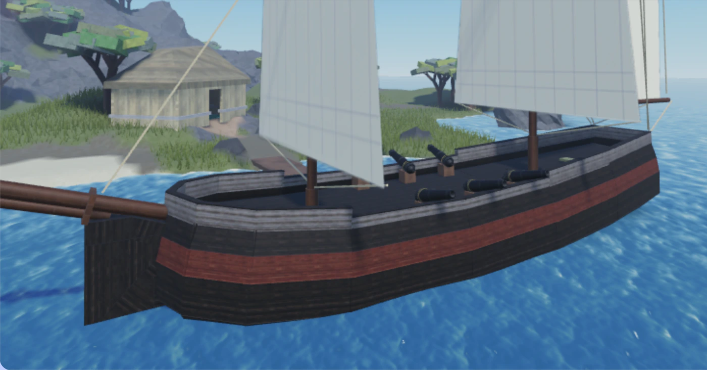A pirate ship with white sails and a red stripe on blue water, off an island with a wooden hut