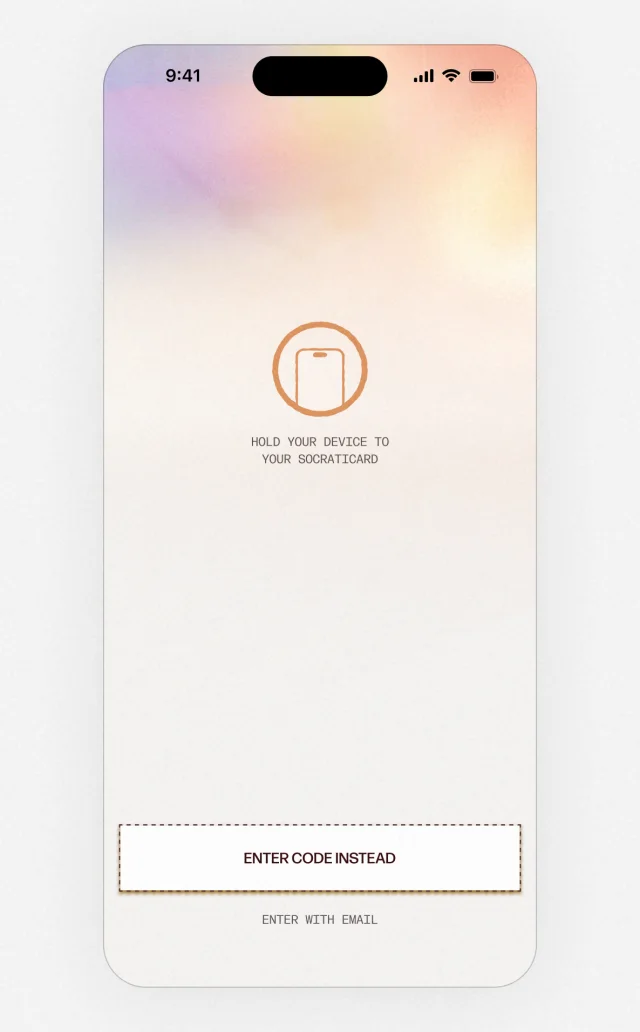 A phone screen under a soft pink and gold wash: hold your device to your Socraticard, with Enter code instead and Enter with email below